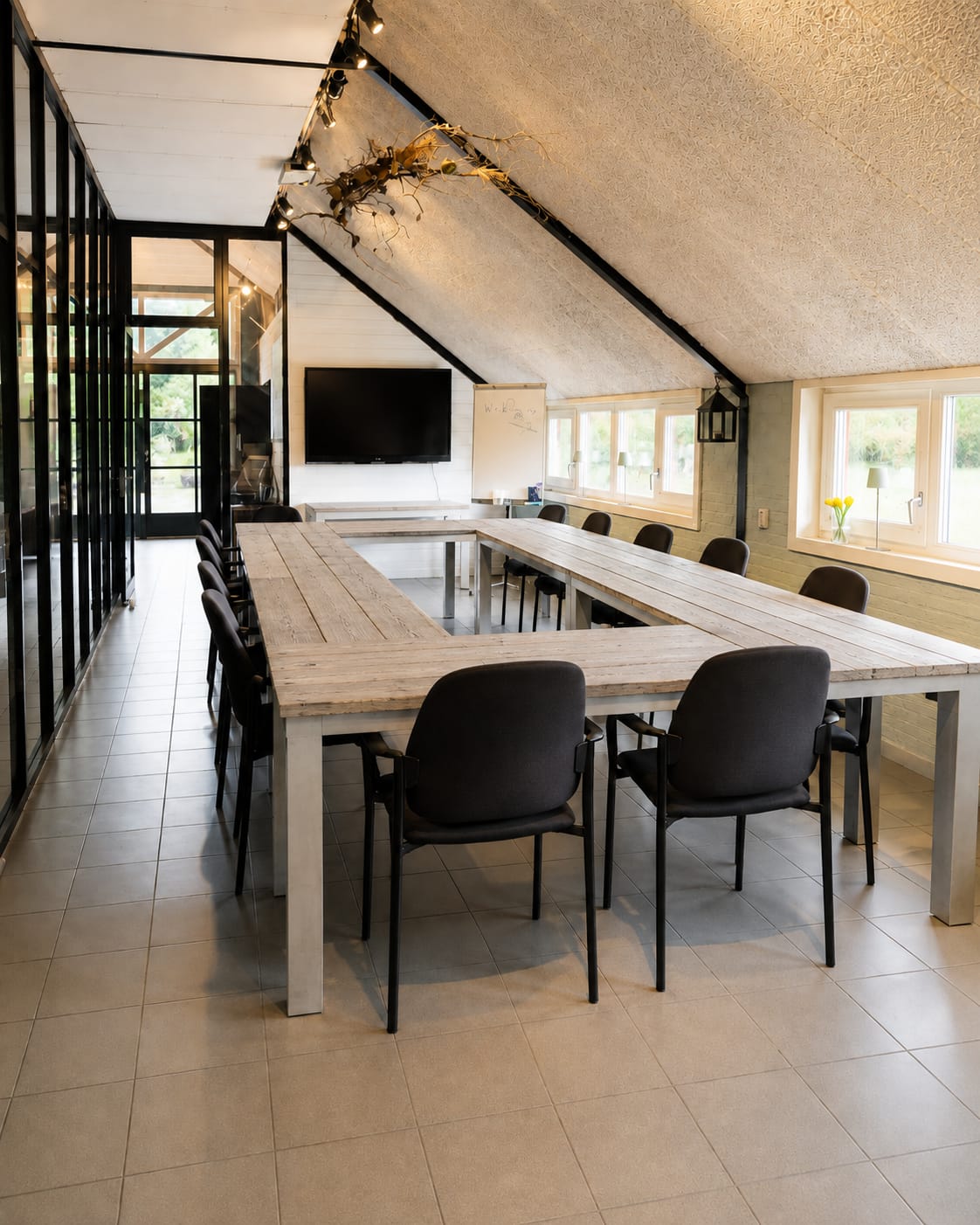 The light space of De Vonk with a view of greenery